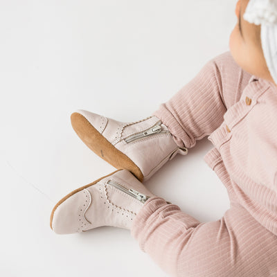 Baby wearing baby windsor boots in colour Stone