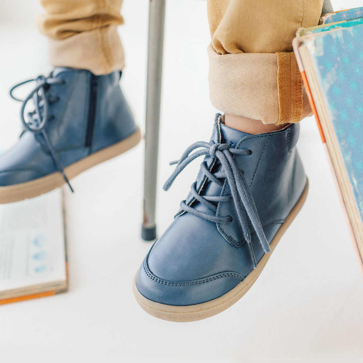 Toddler wearing Archie boot in midnight blue colour