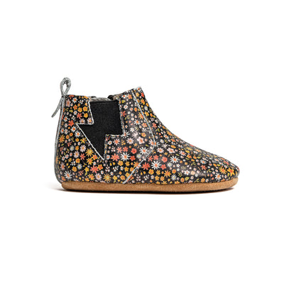 Side view of baby boots with flower design