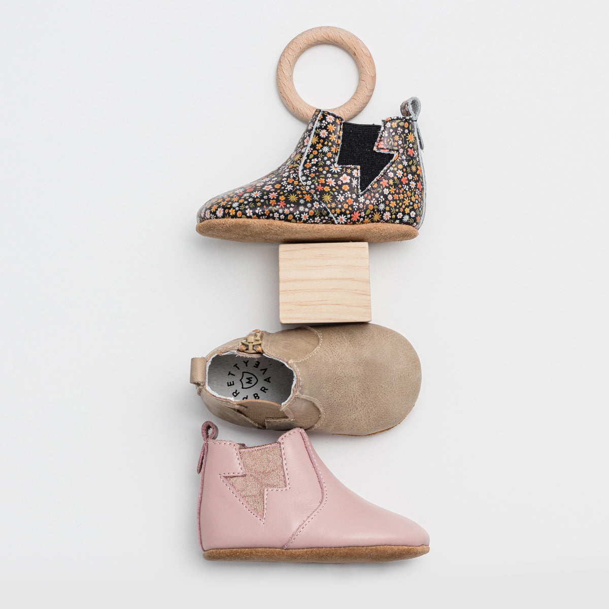 Three single baby boots