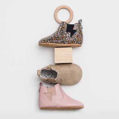 Three single baby boots
