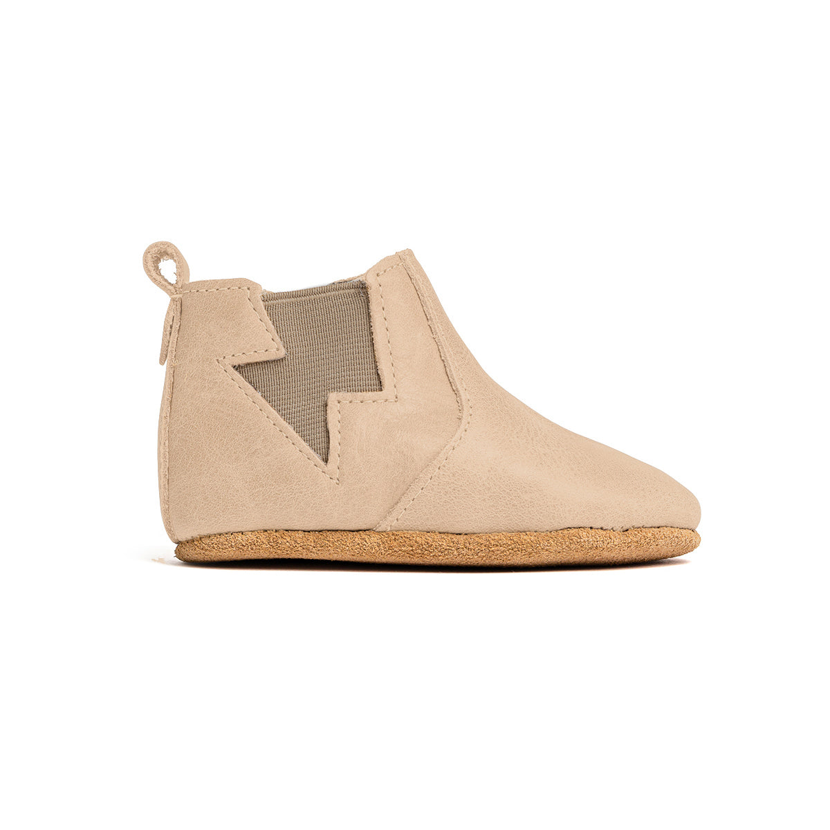 Side view of baby electric boot in colour sand