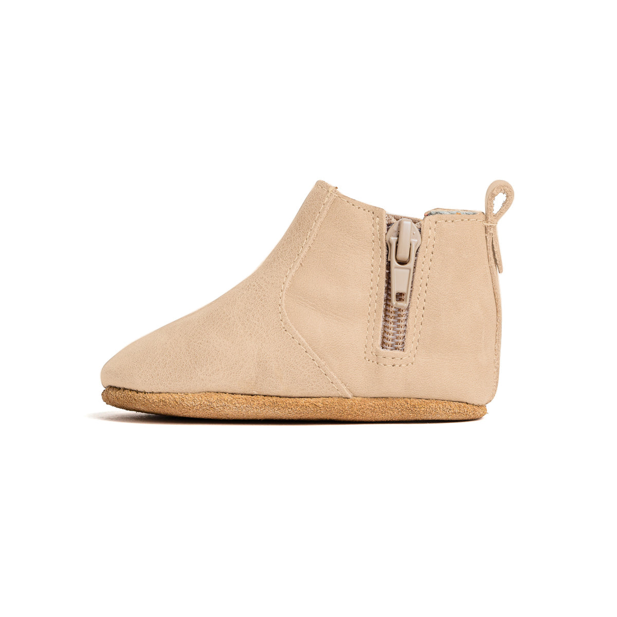 Side view of baby electric boot in colour sand with zip detail