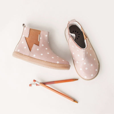 Pair of Electric boot design in colour Primrose next to two pencils
