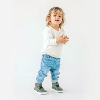 Toddler wearing Harley ankle boot in colour olive