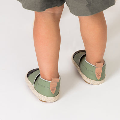 Child wearing Pairn design baby shoes in colour Sage