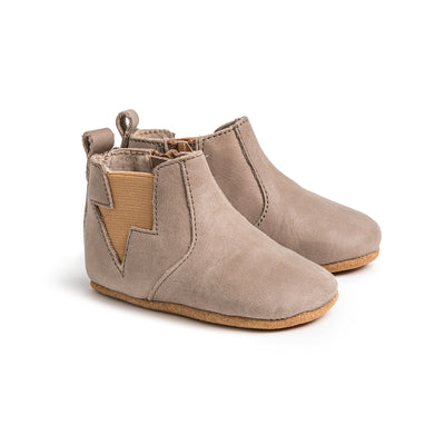 Pair of baby electric boots in colour taupe