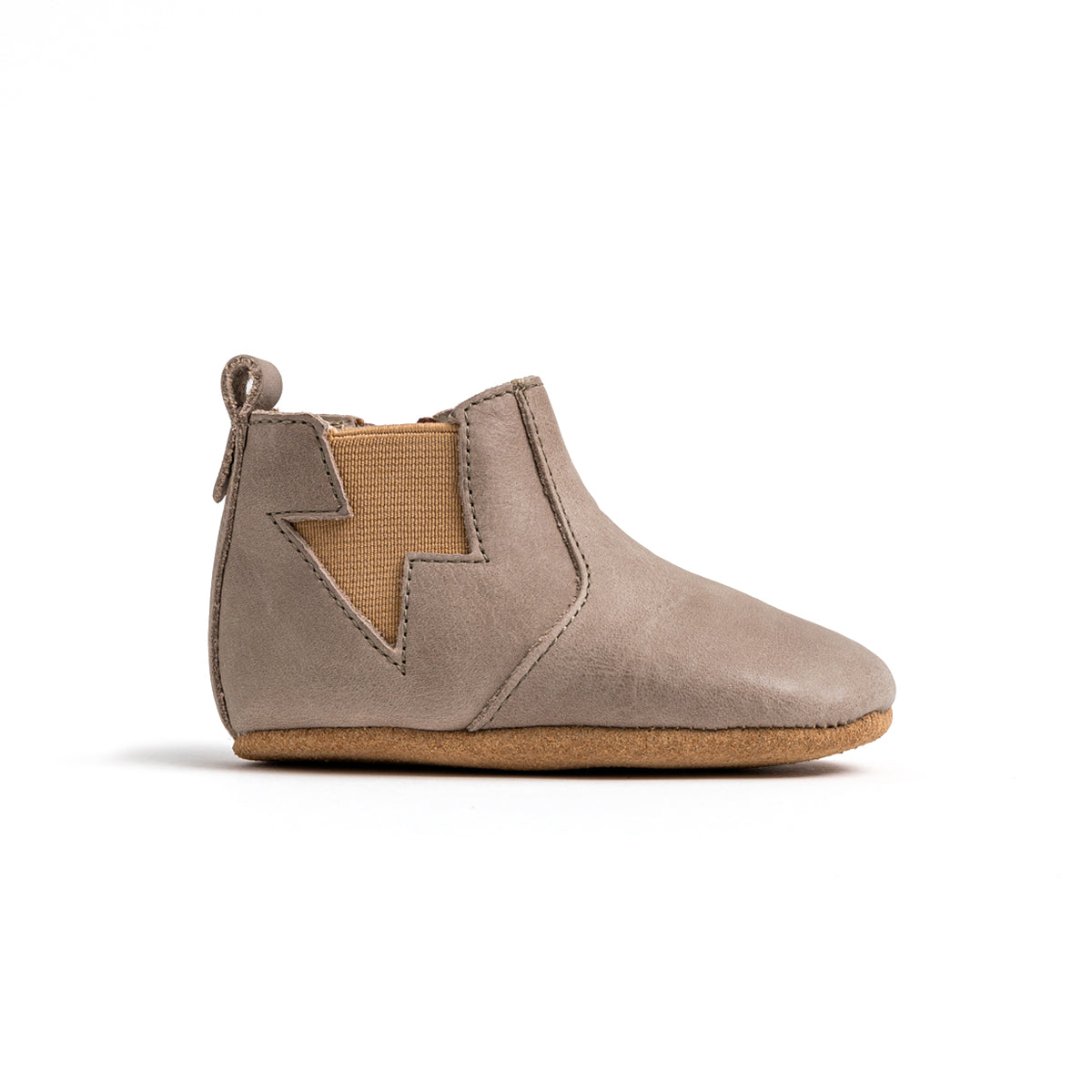 Side view of baby electric boots in colour taupe
