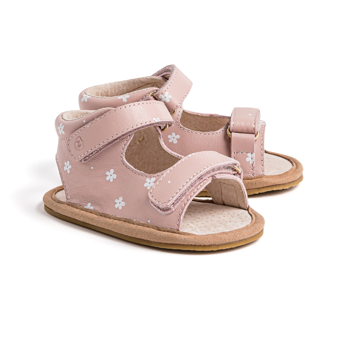 Pair of baby pink sandals with white daisy detail