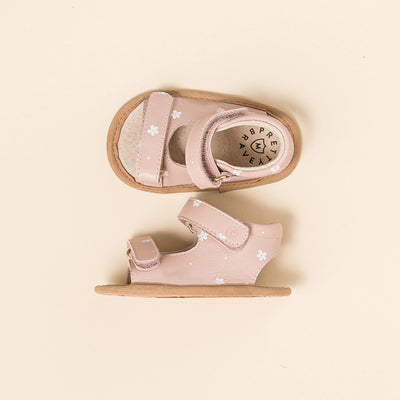 Pair of baby pink sandals with white daisy detail