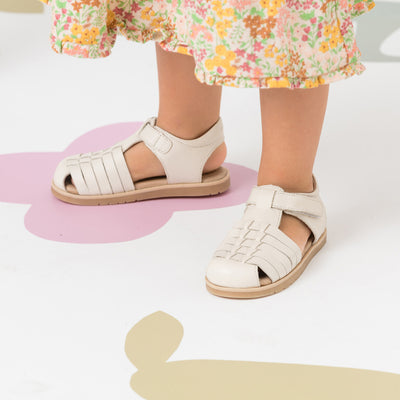 Child wearing Frankie sandal in colour Stone